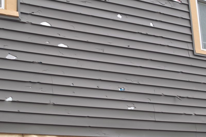 Vinyl Siding Caulk Repair